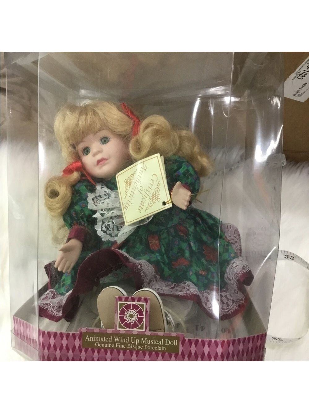 Soft Expressions Animated wind up musical doll